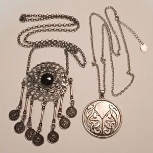 #761.  2 Piece Black And Silver Toned Pendant Necklace Bundle